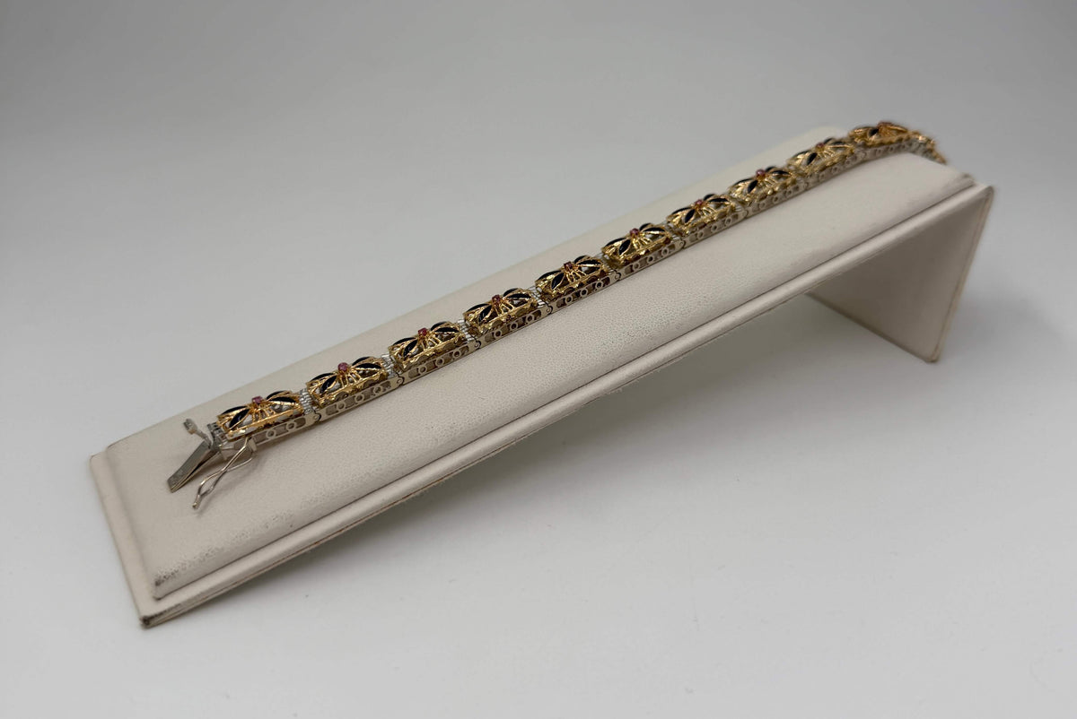 BRACCIALE ORO 18KT BICOLOR semirigido con smalto blu 20,93G