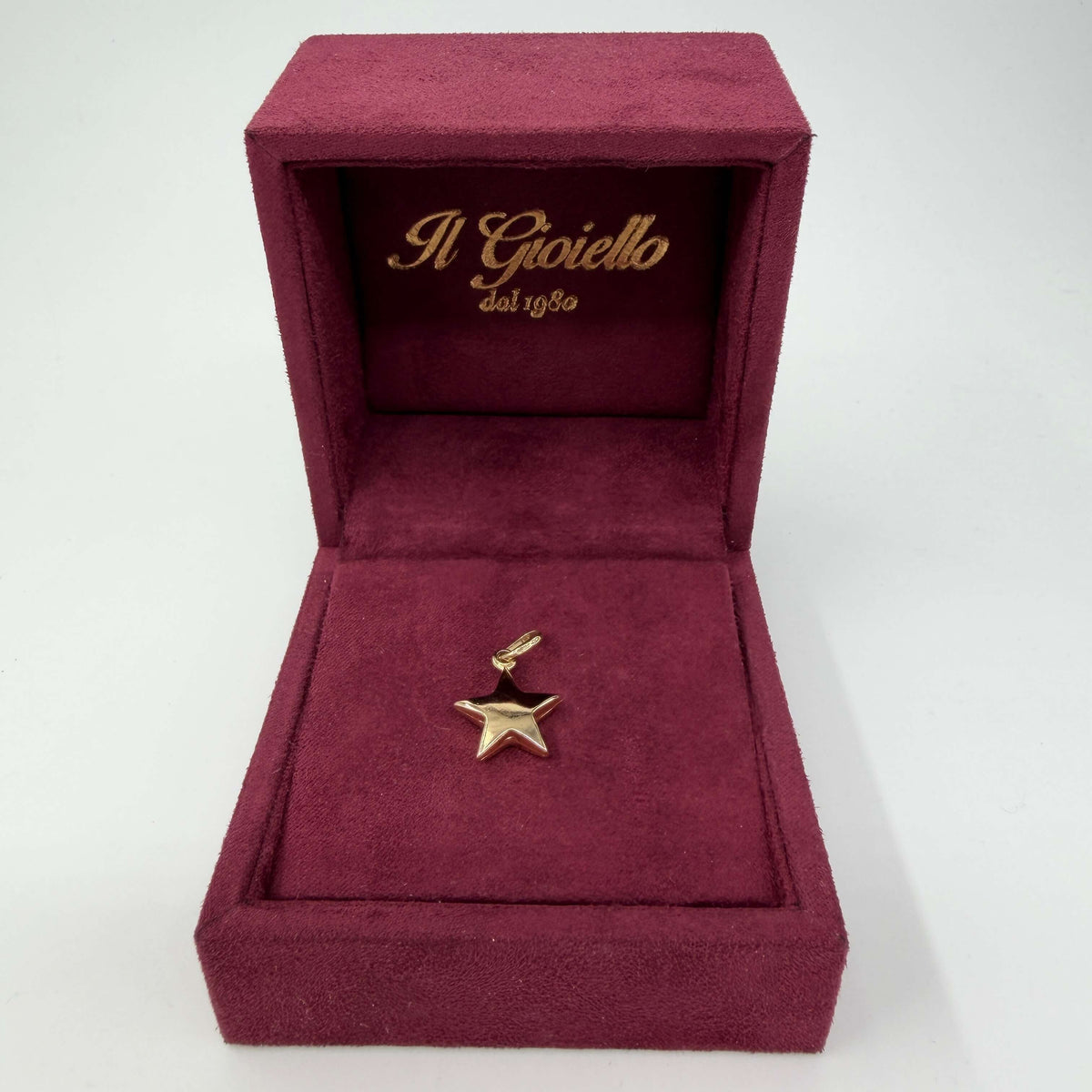 CIONDOLO ORO 18KT GIALLO Stella 1.24 gr