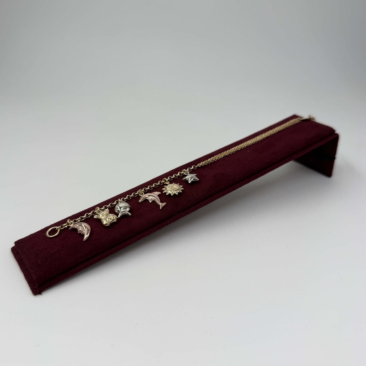 BRACCIALE ORO 18KT TRICOLOR Rollò con Charms 9.55 gr