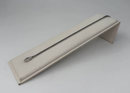 BRACCIALE 18 KT BIANCO CON DIAMANTI NERI