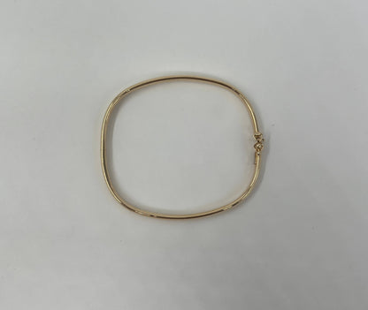 BRACCIALE RIGIDO 18 KT GIALLO