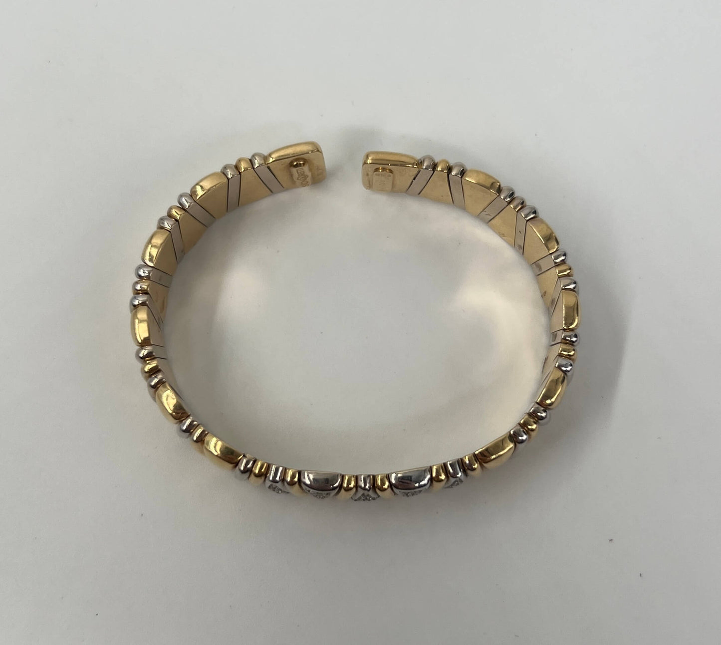 BRACCIALE RIGIDO 18 KT GIALLO E BIANCO E DIAMANTI