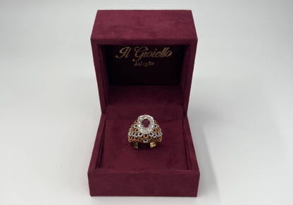 ANELLO IN ORO 18KT BICOLOR, DIAMANTI E RUBINO CENTRALE