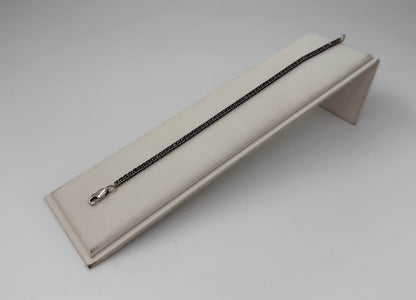 BRACCIALE 18 KT BIANCO CON DIAMANTI NERI