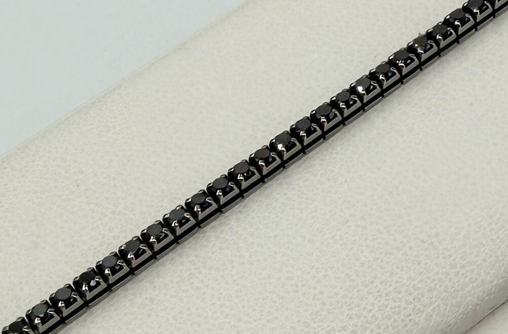 BRACCIALE 18 KT BIANCO CON DIAMANTI NERI