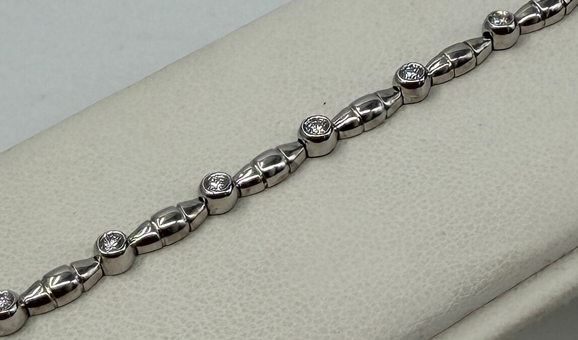 BRACCIALE 18 KT BIANCO CON DIAMANTI