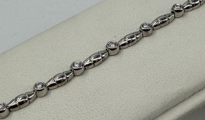 BRACCIALE 18 KT BIANCO CON DIAMANTI