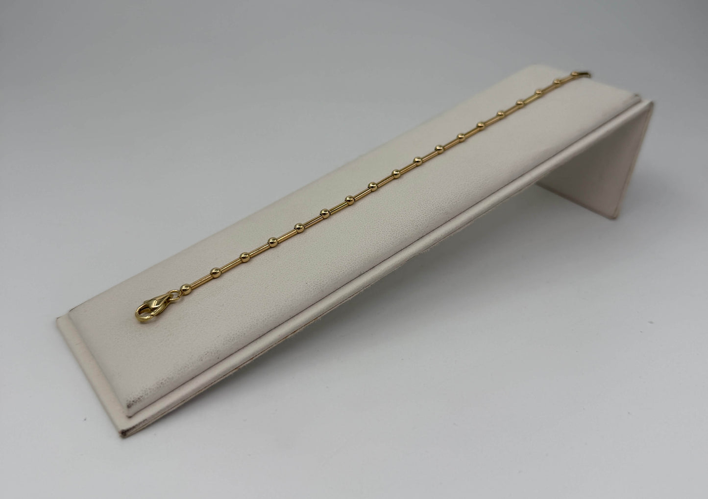 BRACCIALE ORO 18KT GIALLO tubolare / sfera 4.35G