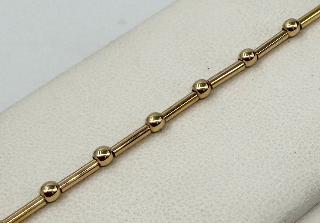 BRACCIALE ORO 18KT GIALLO tubolare / sfera 4.35G