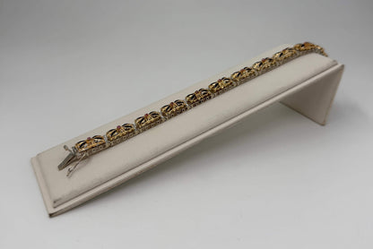 BRACCIALE ORO 18KT BICOLOR semirigido con smalto blu 20,93G