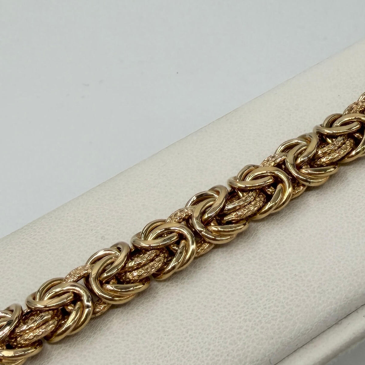 BRACCIALE ORO 18KT GIALLO Intrecciato Piatto 19.68 gr