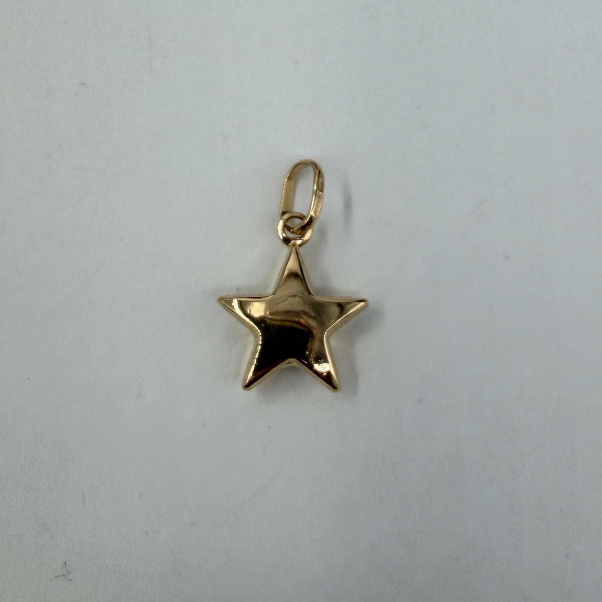 CIONDOLO ORO 18KT GIALLO Stella 1.24 gr