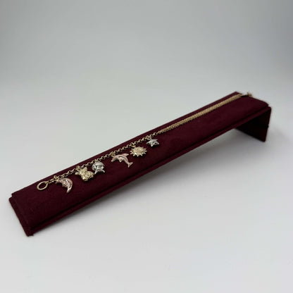 BRACCIALE ORO 18KT TRICOLOR Rollò con Charms 9.55 gr