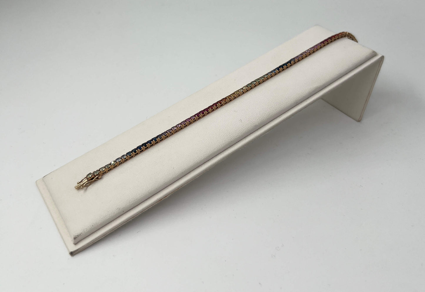 BRACCIALE TENNIS 18 KT ROSA CON ZAFFIRI RAINBOW