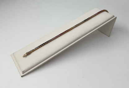 BRACCIALE TENNIS 18 KT ROSA CON ZAFFIRI RAINBOW